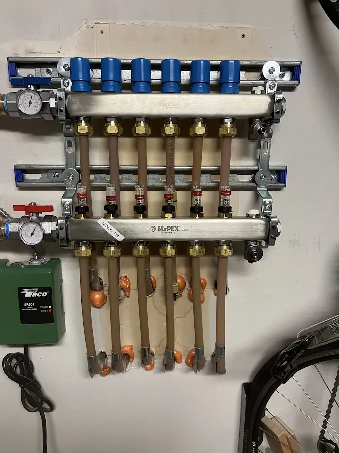 Plumber performing Water Heater Repair at a residential property in Rising Sun-Lebanon